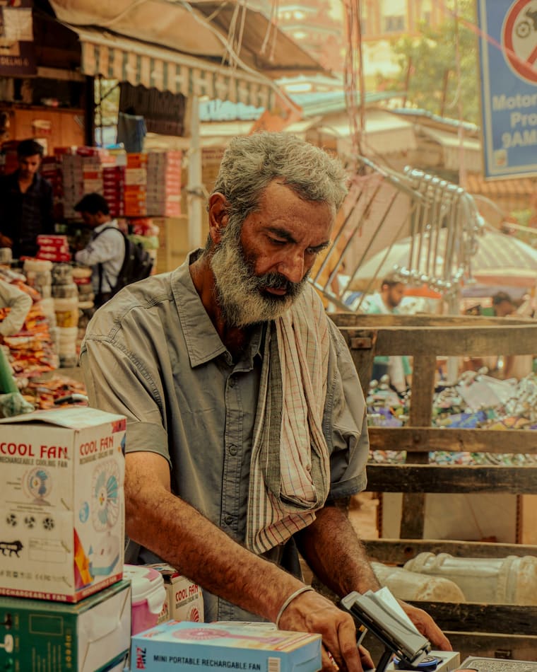 A trader at his market counter